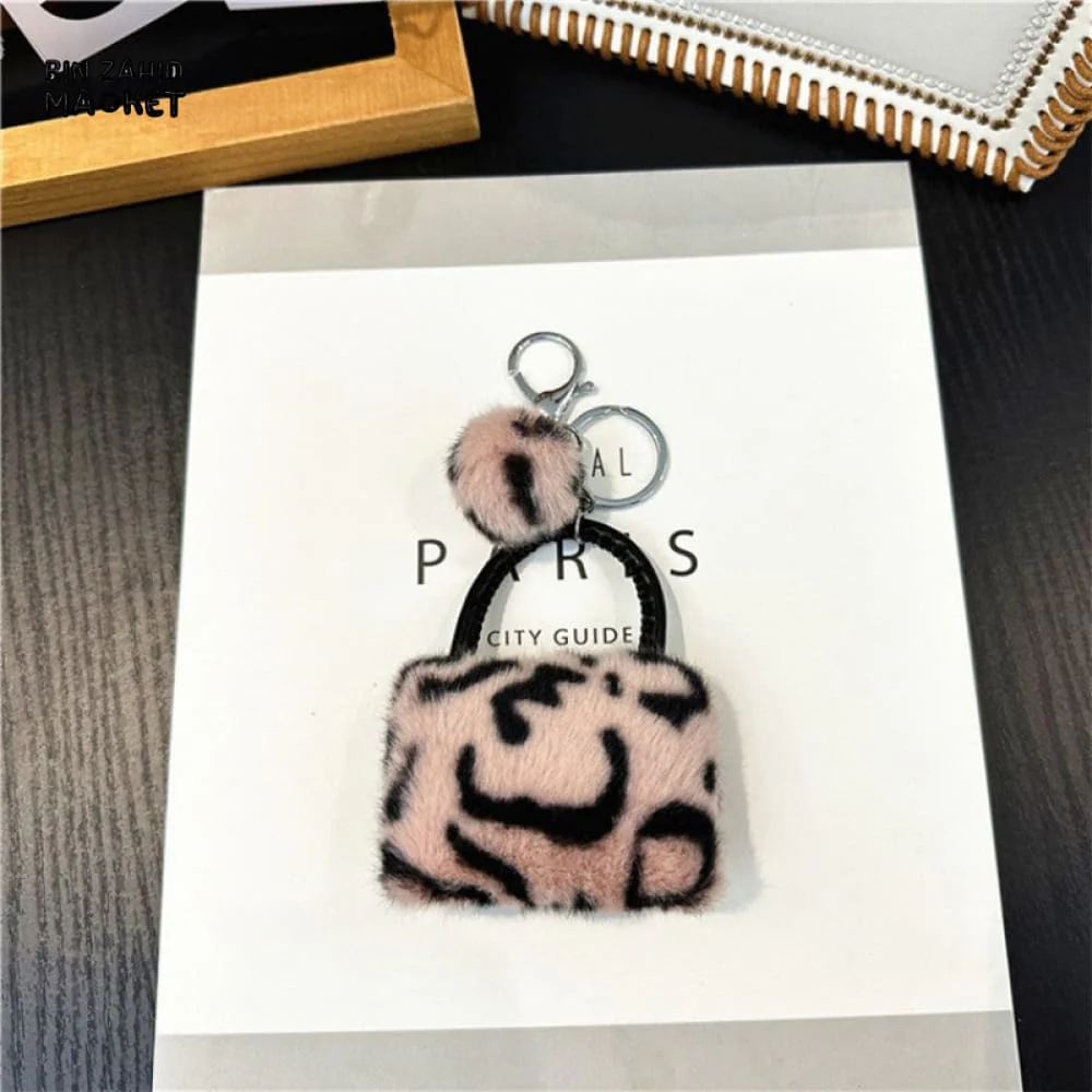 LEOPARD PATTERN BAG KEYCHAIN WITH FLUFFY BEAD — BACKPACK PHONE & CAR ACCESSORY - Image 4