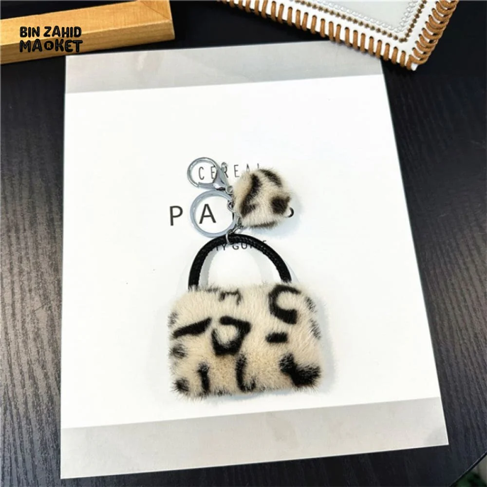 LEOPARD PATTERN BAG KEYCHAIN WITH FLUFFY BEAD — BACKPACK PHONE & CAR ACCESSORY - Image 6
