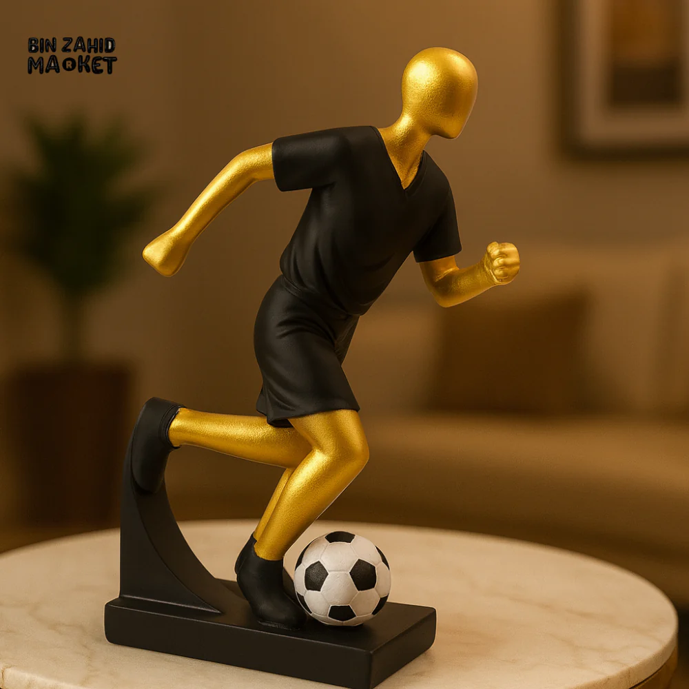 MODERN SOCCER PLAYER FIGURINE – GOLD AND BLACK TABLETOP SCULPTURE